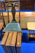 An early 20th Century vase back dining chair and four oak drawers