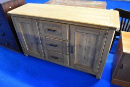 A modern oak sideboard, dimensions approx. W144 D50 H85cm