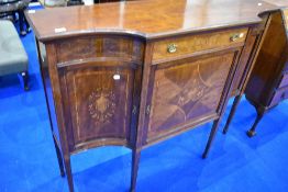 An Edwardian mahogany breakfront chifonier base, having typical vase and swag inlay, width approx