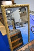 A large gilt frame wall mirror, current fixed for portrait orientation, approx 132 x 71cm