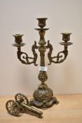A Victorian brass three branch candelabra, measuring 40cm tall, sold with an ornamental brass