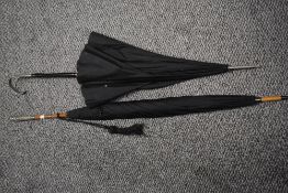 Two late 19th/early 20th Century parasols, the largest measures 95cm long