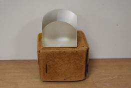 A vintage magnifying glass with box, or domed rectangular form.