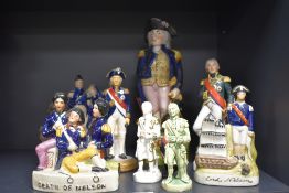 A collection of vintage figurines,of Lord Nelson interest, including Stafforshire pottery.