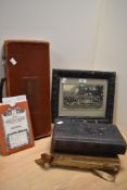Two Victorian leather bound photograph albums, a framed early 20th Century school photograph, an