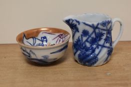 A 19th Century blue and white porcelain miniature jug, measuring 5cm, and a Chinese polychrome