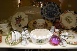 A 19th Century Dutch earthenware plate, hand painted with a foliate design and having a diameter