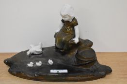 An Ernest Justin Ferrand , 1856-1932 Art Deco ink stand, having cast metal and porcelain depiction