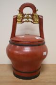 A 19th century Asian red lacquered bucket of wedding basket, having seal mark to lid and metal