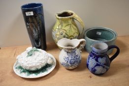 A 20th Century studio pottery vase, glazed in mottled blue and stamped 'Eden' to the base, measuring