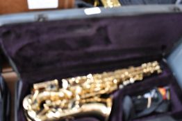 A Simba Instruments alto saxophone with unbranded mouthpiece and simba case, serial number LSA5436