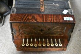 A vintage melodeon, marked Italian Model with Ajax Reeds