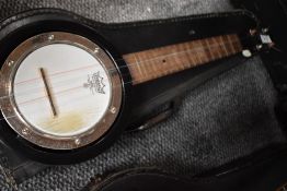 A traditional banjolele with case
