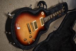 A Gibson Les Paul Studio electric guitar, serial number , 025751326, sunburst finish in fitted