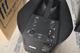 A Bose L1 Compact, portable PA system , great little piece of kit, well used but functions OK on