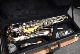 A FF (Fortissimo?) tenor saxophone in silvered finish with unbranded mouthpiece and hard case