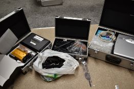 A mixed lot of three cases, lighting including LED and laser show, and a projector, and selection of