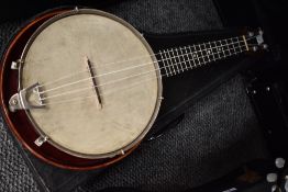 A traditional banjolele with case