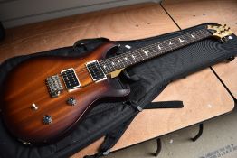 A PRS CE electric guitar, possible serial number handwritten to reverse of headstock 16 234325 ,