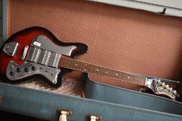 A vintage electric guitar, (Teisco) Tuxedo Three