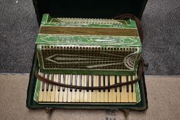 A vintage piano accordion , Settimio Soprani Three, in case