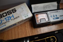 A Boss TU-12H tuner, boxed