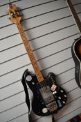 An interesting vintage (Shergold) Hayman electric bass guitar having semi hollow body, probably