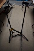 Two Hercules guitar stands