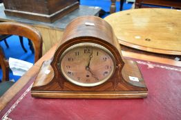 An early 20th Century napoleon mantel clock with marquetry decoration