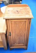 A Victorian pot cupboard of narrow proportions