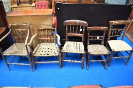 A selection of 19th Century country style spindle back chairs, various designs, including local