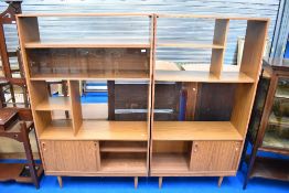 Two 1980s teak effect laminate room divider shelving units