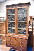 A 19th Century mahogany bookcase having astral glazed top section, with two over three drawer base