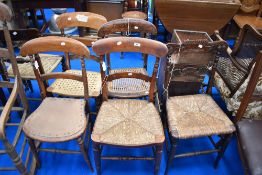 Three 19th Century railback chairs, two having rush seats
