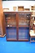 A modern dark laminate display cabinet