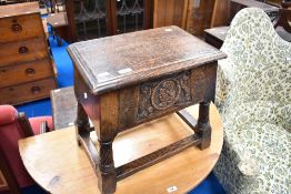 A period style oak carved box stool