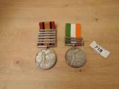 A pair of Queen and King South Africa Medals, Queens Medal with six clasps, Belmount, Modder
