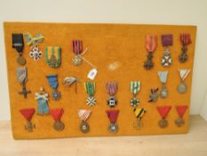 A collection of European and World Medals, Belgium 1909 with a 1914 Bar, The Society of Brussels for