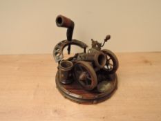 A Victorian smokers compendium in the form of a cannon, the barrel forms a vesta holder with striker