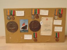 A Board Display of Merchant Navy Seaman all killed during WWI after being sunk by German Submarines,