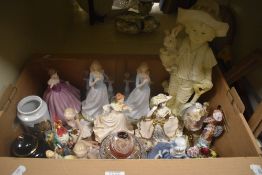 A carton of assorted figurines including a Coalport 'Heart to Heart' lady, a crystal rose bowl and