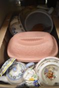 A vintage Bay Original Romertopf casserole dish with instructions, a blue and white chamber pot
