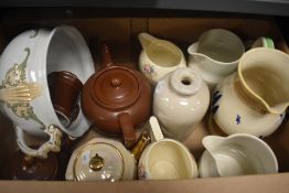 a selection of assorted jugs and teapots including Royal Doulton, Wedgwood & Co Ltd and Langley Ware