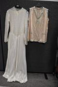A 1930s/ 1940s white lace and grosgrain dress, having tie belt to waist, full length fitted