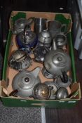 A collection of pewter and similar including planished teapots and jugs.