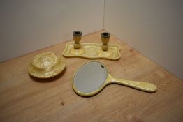 An Art Deco lucite dressing table set.