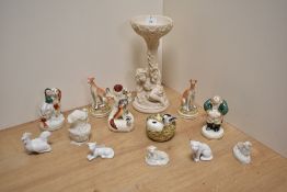 An assorted collection of 19th Century Staffordshire wares, to include a pair of whippets and sheep,