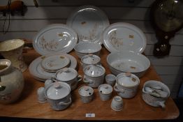 Approximately twenty one pieces of Denby 'Normandy' stoneware including three covered soup dishes