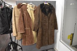 Three ladies sheepskin coats including a ladies dark brown double breasted sheepskin coat size 46'