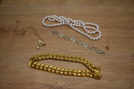 A selection of necklaces comprising a chunky curb link chain statement necklace, a rope of